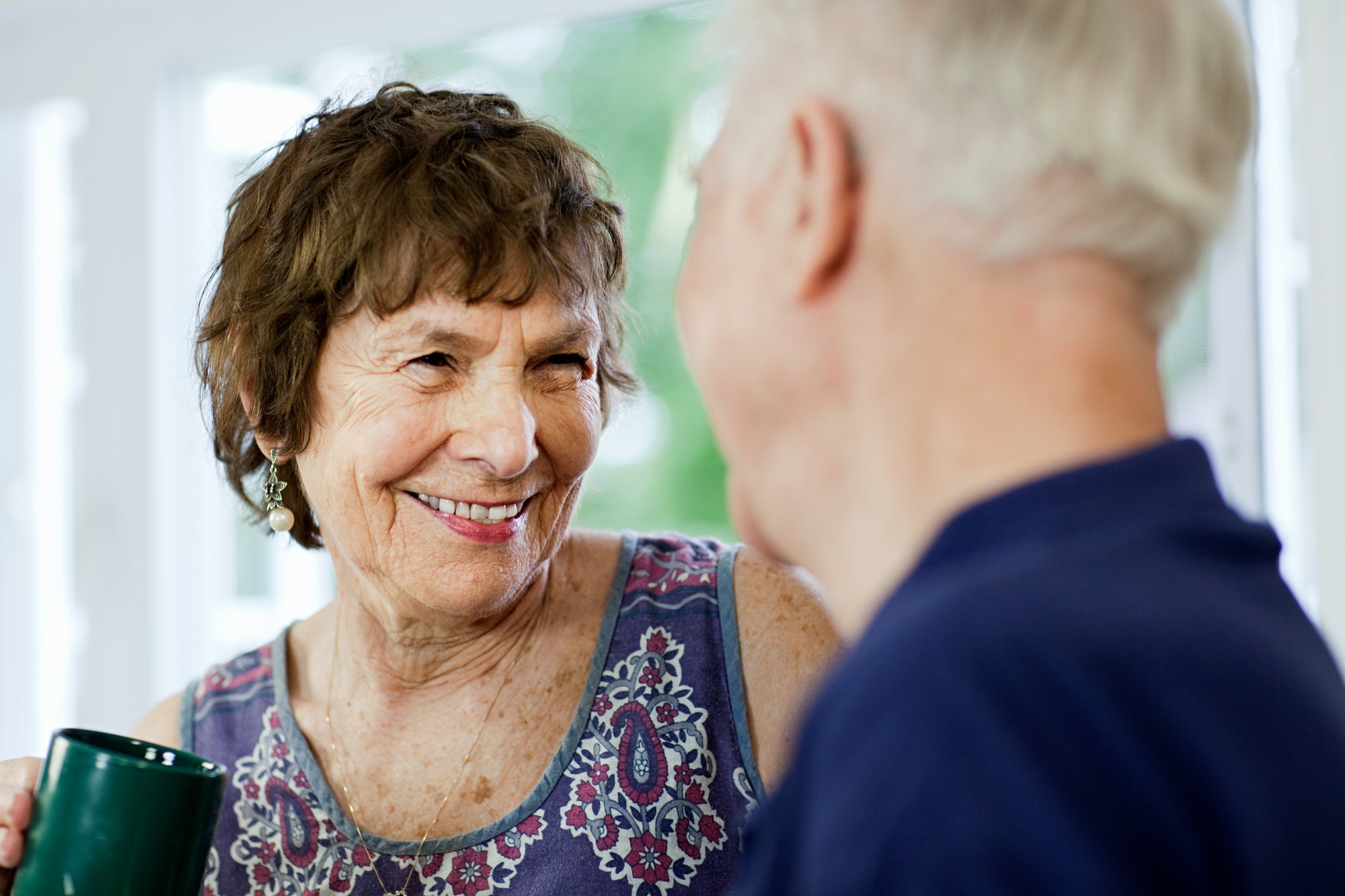 Senior couple discussing what their Medicare Advantage covers.
